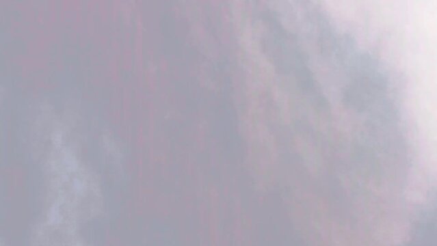 Timelapse of white clouds at the sky