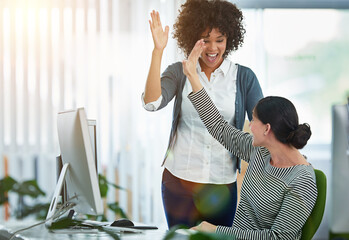 High five, teamwork and business women in office with success for creative project together. Happy,...