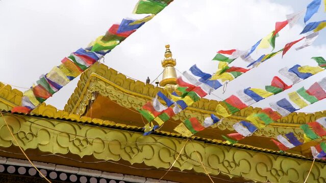 Colorful prayer flags in the wind at a Buddhist Temple in Leh in India's Ladakh region