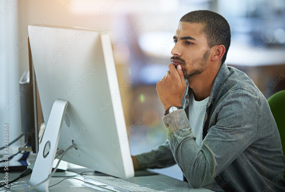 Poster Man, computer and thinking as web designer in office for software programming, thoughts or project planning. Male person, desktop and IT decision with media research for networking, skill or ideas