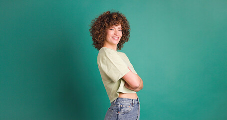Smiling woman on green background