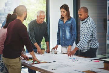 Business people, architect and discussion in meeting with blueprint for building project, brainstorming or diversity. Architecture, employees or collaboration with paperwork in boardroom for proposal