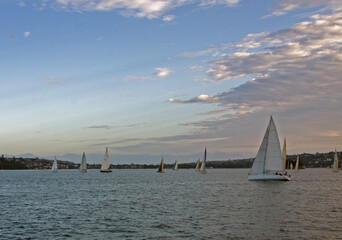 sailboats at sunset