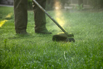 Lawn mover on green grass. Machine for cutting lawns.