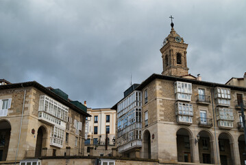 Camp of the Church of San Miguel Arcángel Gothic-Renaissance temple of the XIV century. Photo taken in some streets of the Old Town of Vitoria-Gasteiz, Spain. A quadrangular tower with its bells.