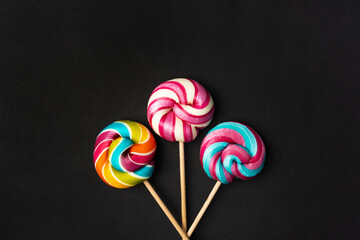 Color lollipop, spiral candy on stick, colorful striped lollypop, round fruit caramel, circle...