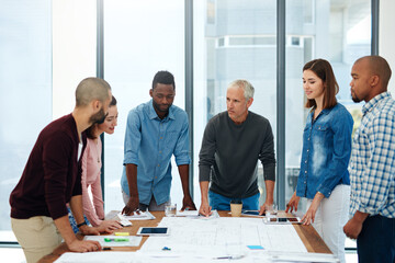 Business people, architect or team in meeting with floor plan for building design, brainstorming or...