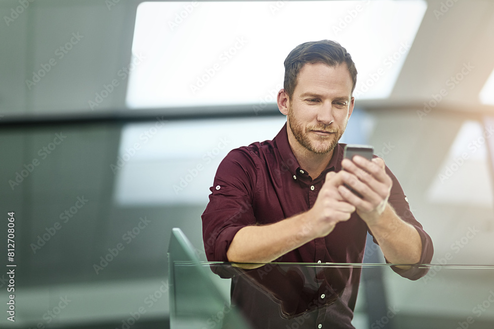 Leinwandbilder businessman, typing and reading with phone at office for networking, communication or sending messag