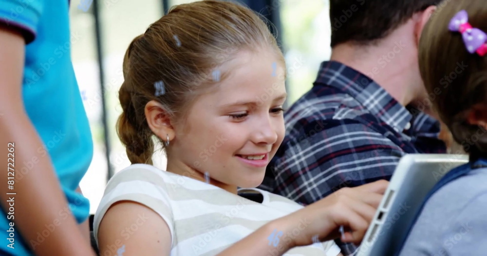 Poster image of falling numbers over close up of smiling caucasian girl using digital tablet