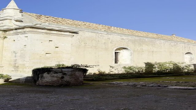 Arcadi church of transfiguration Crete, Greece. Ancient monastery, walking video, vertical, old European architecture, medieval mood, sunset, historic point