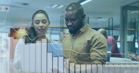 Image of financial data processing over diverse business people in office