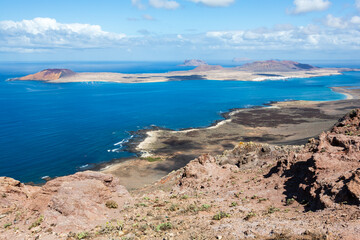 Viewing at La Graciosa island from Risco de Famara, Guinate, Lanzarote, Spain
