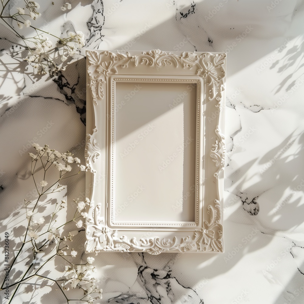 Poster a white picture frame with an empty space inside, sitting on top of a marble surface.