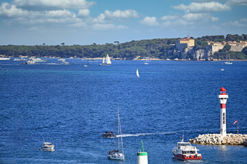 Luxury yachts sailing near port in Cannes city France
