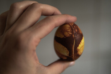 easter eggs in the hand of the girl