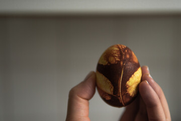 easter eggs in the hand of the girl
