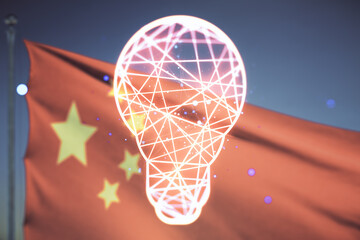 Abstract virtual light bulb hologram on flag of China and blue sky background, idea concept. Multiexposure - Powered by Adobe