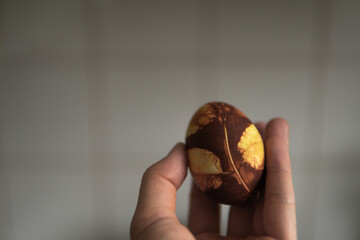 easter eggs in the hand of the girl