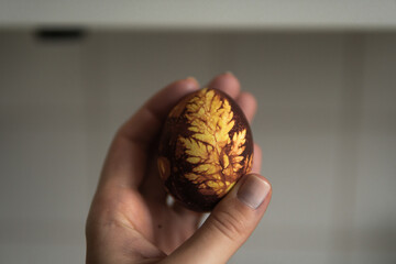 easter eggs in the hand of the girl