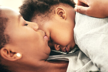Mother, baby and sleeping in closeup for bonding or security, love and peace with trust. Black...