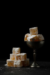 Eastern sweetness Turkish delight on a black background