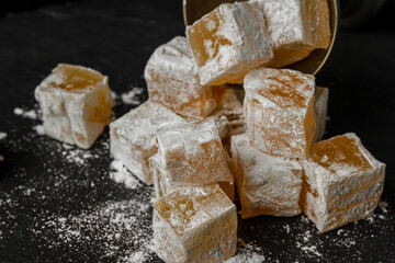Eastern sweetness Turkish delight on a black background