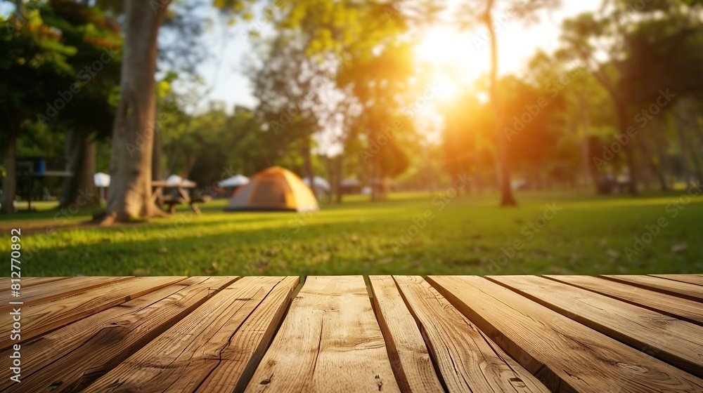 Poster wooden table top on blur tent camping travel tent and grass fieldfresh and relax conceptfor montage 