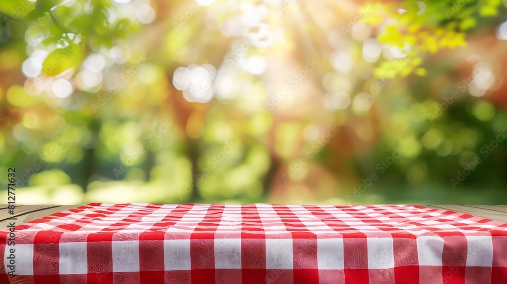 Poster food background picnic table with tablecloth for food product display over blur green nature outdoor