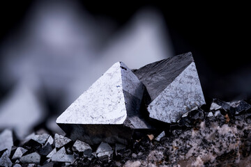 Magnetite crystals on feldspar photography isolated on black blackground. From Cerro Huañaquino,...