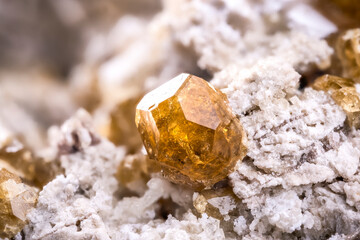 Vesuvianite crystal, from Mexico. macro photography detail texture background. close-up raw rough...