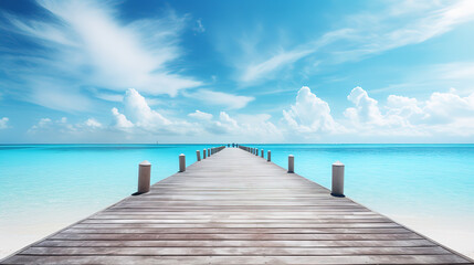 Obraz premium Long Wooden Pier Leading into Serene Blue Ocean