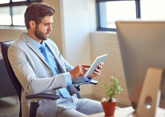 Businessman, online and relax in office with tablet for news or updates on company growth, networking and business website. Man, digital technology and internet for research, emails and report review