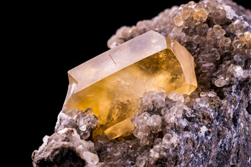 yellow calcite on matrix, From belgium. macro photography detail texture background. close-up raw...