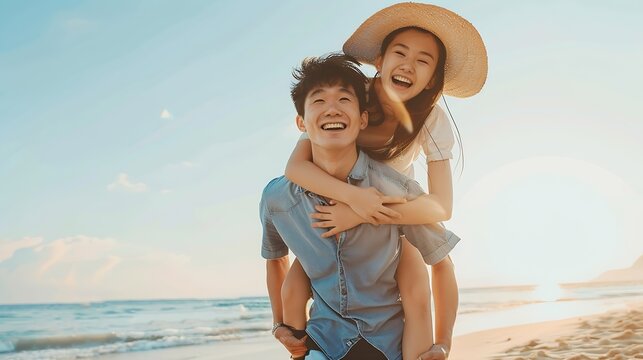 Happy couple in love on beach summer vacations Joyful Asian girl piggybacking on young Caucasian boyfriend playing and having fun in sunny tropical destination for travel holiday : Generative AI
