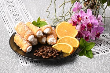 Homemade baking - grandma baked sweet puff pastry tubes,
filled with snow from egg whites or whipped cream,
traditional Czech delicacy.