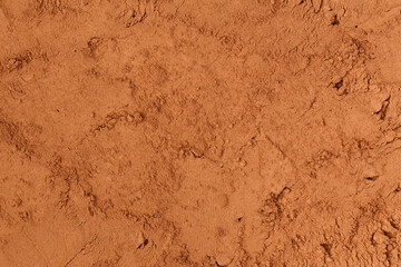 Abstract embossed brown background made of powder