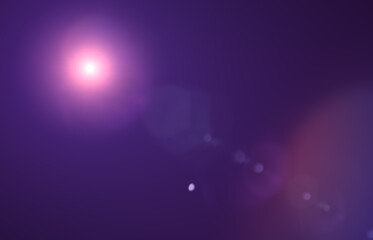 Lens flare glow light effect on black. image of rays purple light effects, overlays or flare isolated on black background for design. abstract lens flare light over black background