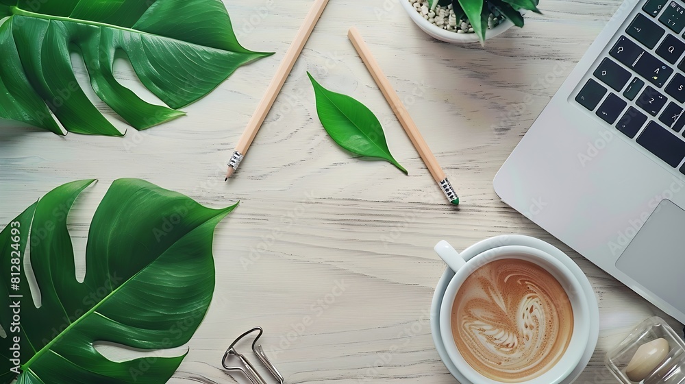Poster flat lay top view office table desk workspace with laptopoffice supplies pencil green leaf and coffe