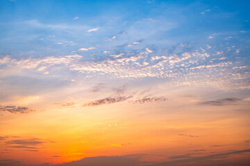 Beautiful , luxury soft gradient orange gold clouds and sunlight on the blue sky perfect for the background, take in everning,Twilight, Large size, high definition landscape photo