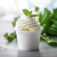 Ice cream in a white cup.