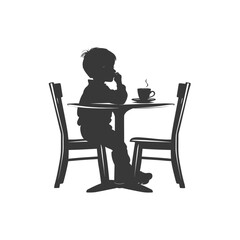 Silhouette little boy sitting at a table in the cafe black color only