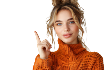 Confident woman dressed orange sweater pointing finger empty space on isolated transparent background