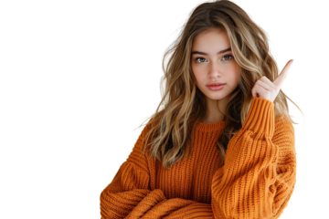 Confident woman dressed orange sweater pointing finger empty space on isolated transparent background