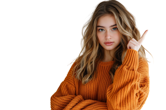 Confident woman dressed orange sweater pointing finger empty space on isolated transparent background