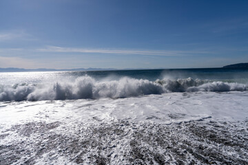 Ocean waves crashing on beach