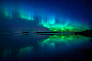 Northern lights dancing over calm lake in north of Sweden. Farnebofjarden national park.