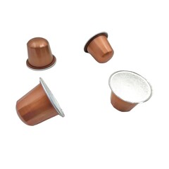Photo of espresso capsules, isolated on white background.
