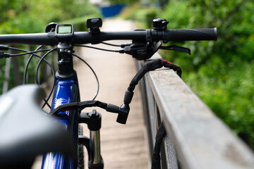 Bike is secured with a bicycle lock. Protection against bicycle theft.