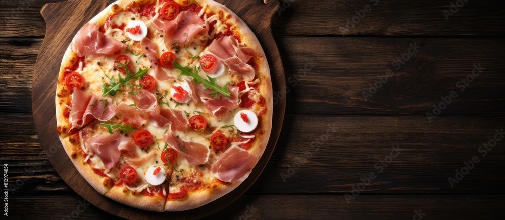 Poster top view of a wooden table showcasing a delicious pizza garnished with prosciutto and mozzarella amp