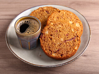 Slices of date and nut roll, with coffee